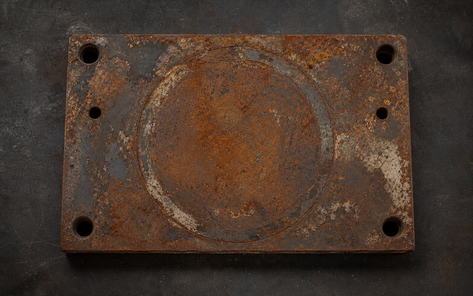 Rusted metal plate before laser cleaning